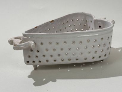 Openwork white earthenware cheese mold decorated...
