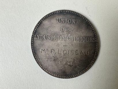 Médaille en argent.
D. 3,5 cm.