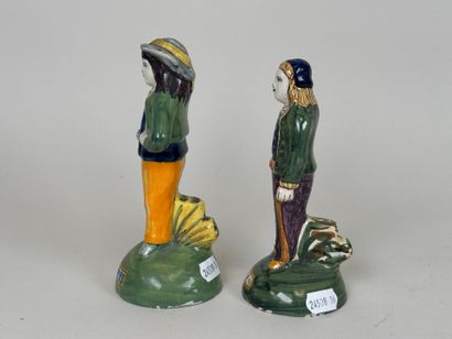 HENRIOT QUIMPER.
Two Breton figures in polychrome...