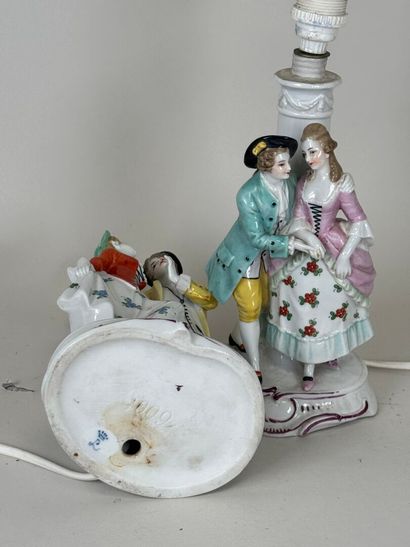Pair of polychrome porcelain subjects with...