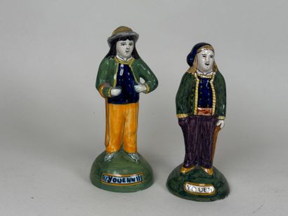 HENRIOT QUIMPER.
Two Breton figures in polychrome...