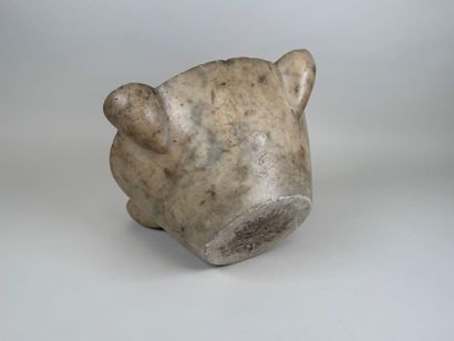 Large marble mortar with four ears, one of...