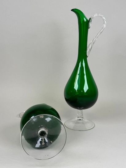 Pair of large ewers in partially colored...