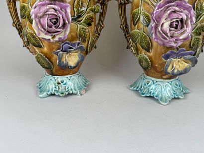 Pair of polychrome barbotine vases with two...