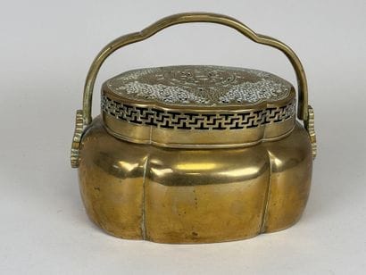 Indochina, 19th century.
Openwork brass incense...