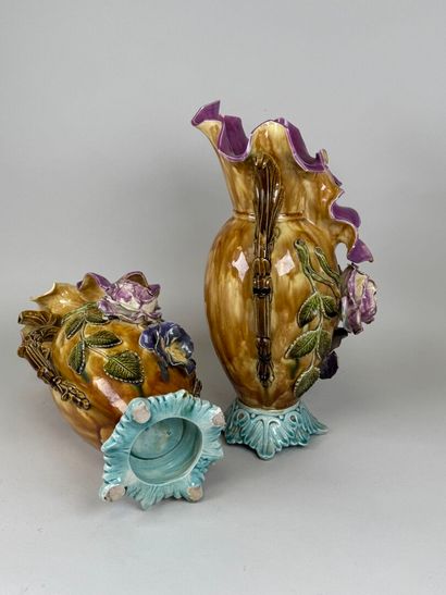 Pair of polychrome barbotine vases with two...
