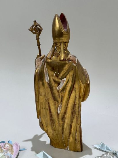Carved and gilded wood and stucco subject...