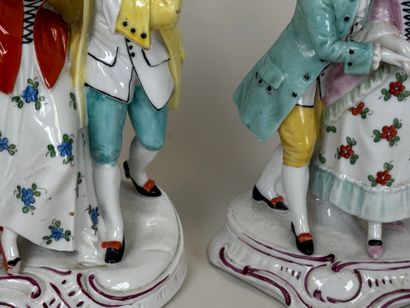 Pair of polychrome porcelain subjects with...