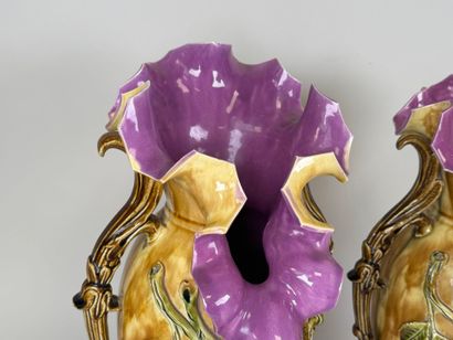 Pair of polychrome barbotine vases with two...