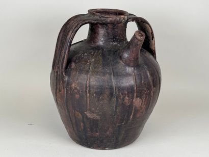 Large oil jar in glazed terra cotta.
H. 33...
