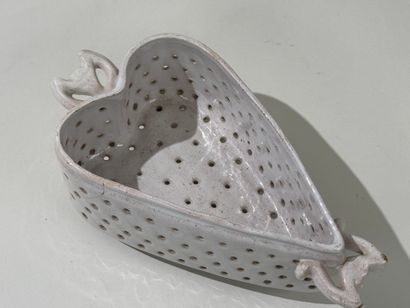Openwork white earthenware cheese mold decorated...