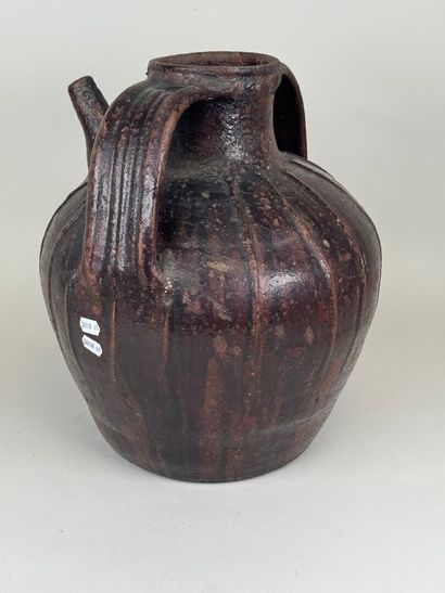 Large oil jar in glazed terra cotta.
H. 33...