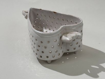 Openwork white earthenware cheese mold decorated...