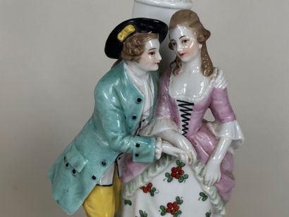 Pair of polychrome porcelain subjects with...