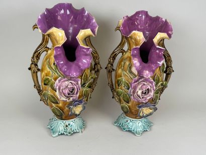 Pair of polychrome barbotine vases with two...