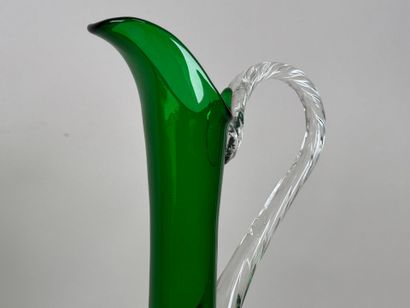 Pair of large ewers in partially colored...