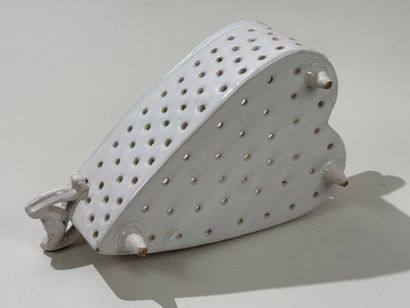 Openwork white earthenware cheese mold decorated...