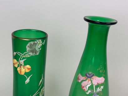 Three colored and enameled glass vases with...