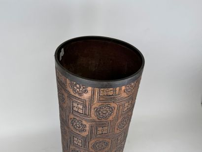 Embossed metal umbrella stand decorated with...