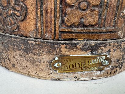 Embossed metal umbrella stand decorated with...