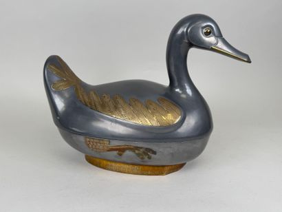 ASIA, 20th century.
Duck.
Large pewter and...