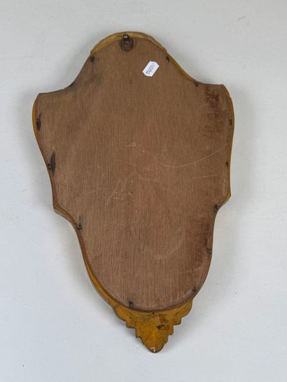 Gilded wood mirror decorated with a stylized...