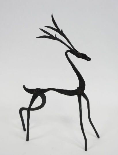 Cerf et serpent en fer forgé laqué noir.
Travail...