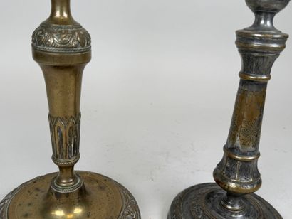 Two ormolu torches, one decorated with vases...
