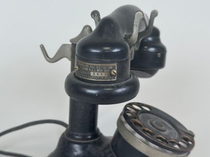ERICSON telephone company.
Metal and bakelite...