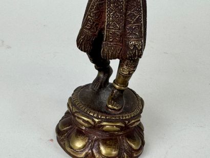 ASIA, 20th century.
Figure.
Subject in patinated...