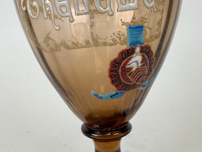 Pichet en verre coloré à décor émaillé marqué...