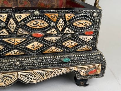 Wooden box covered with copper-alloy metal...