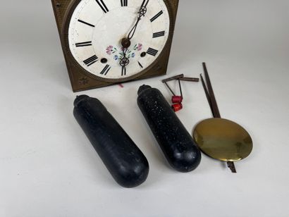 Comtoise movement in repoussé brass, with...