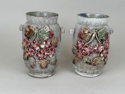 Pair of vases with small handles, decorated...