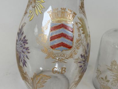 Deux carafes en verre à décor émaillé et...