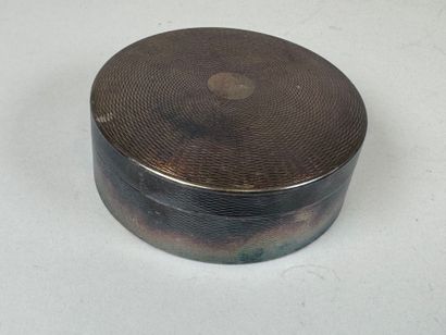 Boite circulaire en métal argenté à décor...