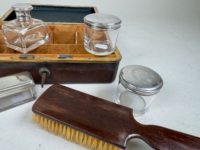 Brown leather travel case, numbered on the...