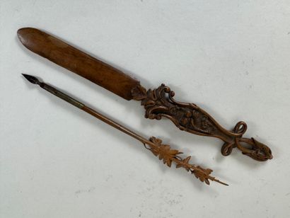 Carved wood letter opener decorated with...