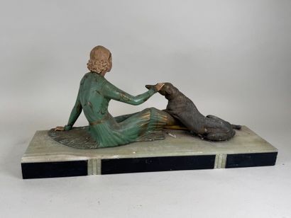 LEDUC, XXe.
Femme au chien.
Importante sculpture...