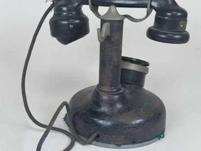 ERICSON telephone company.
Metal and bakelite...