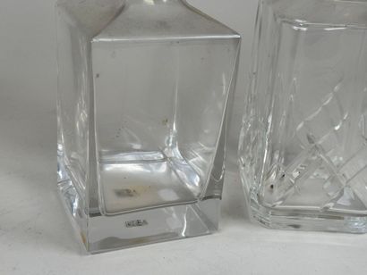 Two crystal and glass whisky or liqueur decanters,...
