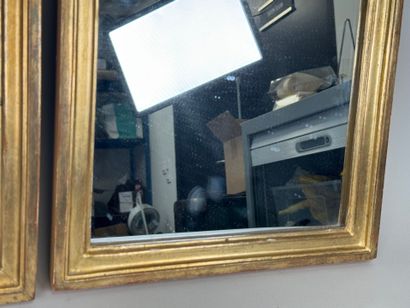 Pair of molded and gilded wood framed mirrors....