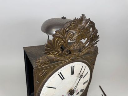 Comtoise movement in repoussé brass, with...