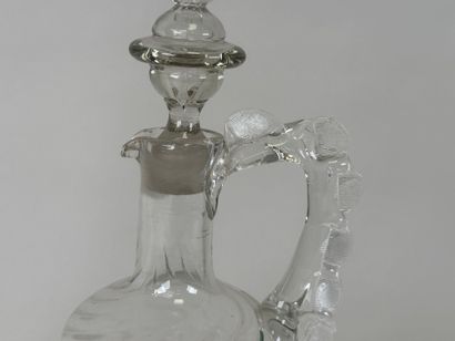 Deux carafes en verre à décor émaillé et...