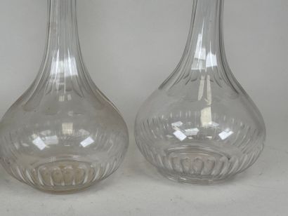 Quatre carafes en cristal,
XIXe.
H. 30 cm...