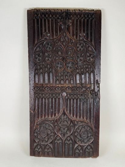 Panneau de meuble en chêne mouluré et sculpté...