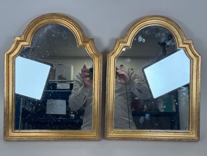 Pair of molded and gilded wood framed mirrors....
