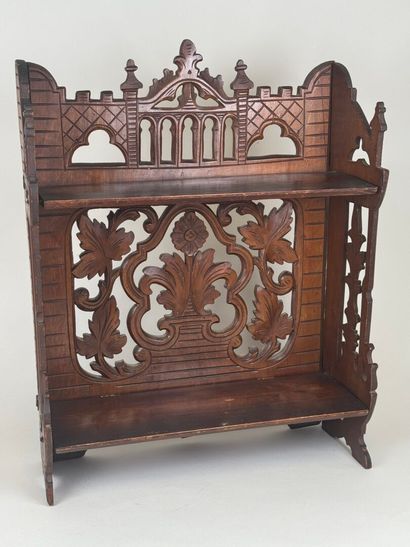 Small shelf in molded and carved wood with...