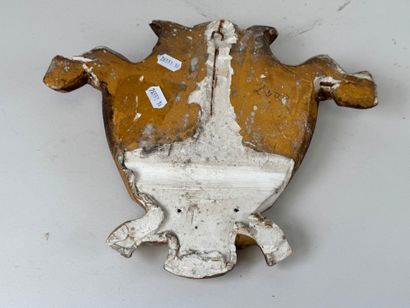 Élément en plâtre sculpté et doré à décor...