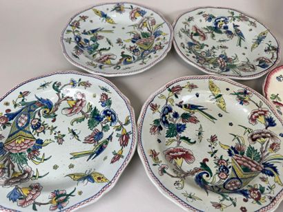 Set in earthenware and polychrome porcelain...